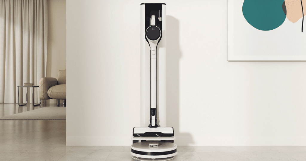Sleek LG CordZero All-in-One Tower cordless vacuum and self-emptying station in a modern living room.