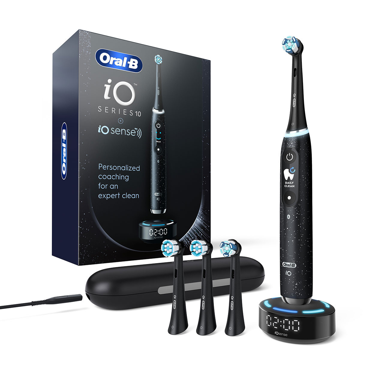 Oral-B iO Series 10 electric toothbrush, iO Sense charger, 3 brush heads, travel case, and packaging.