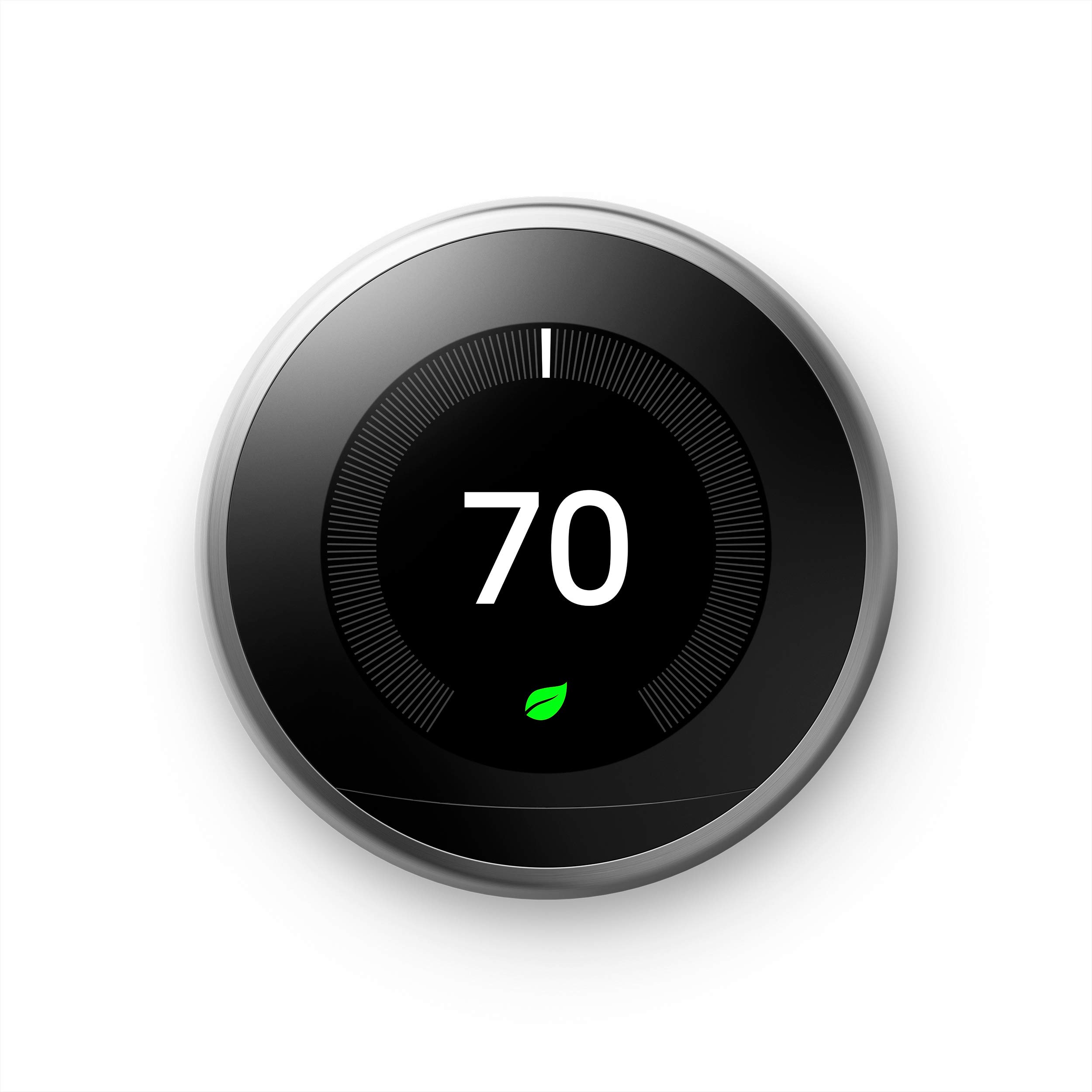 A silver Nest Learning Thermostat showing 70 degrees Fahrenheit and a green leaf, indicating energy-efficient setting.