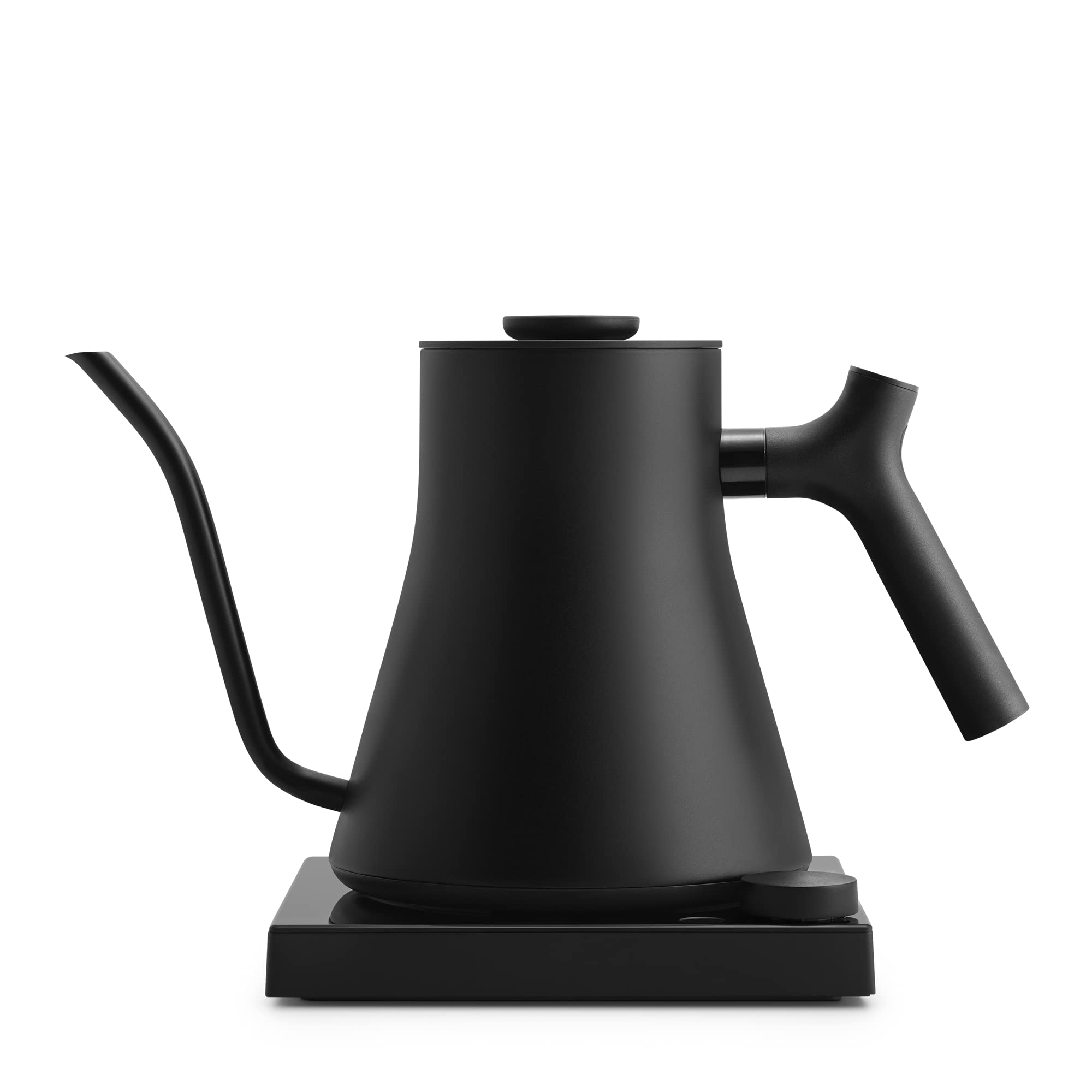 Sleek black Fellow Stagg EKG Pro electric pour-over gooseneck kettle on its minimalist heating base, isolated on white.