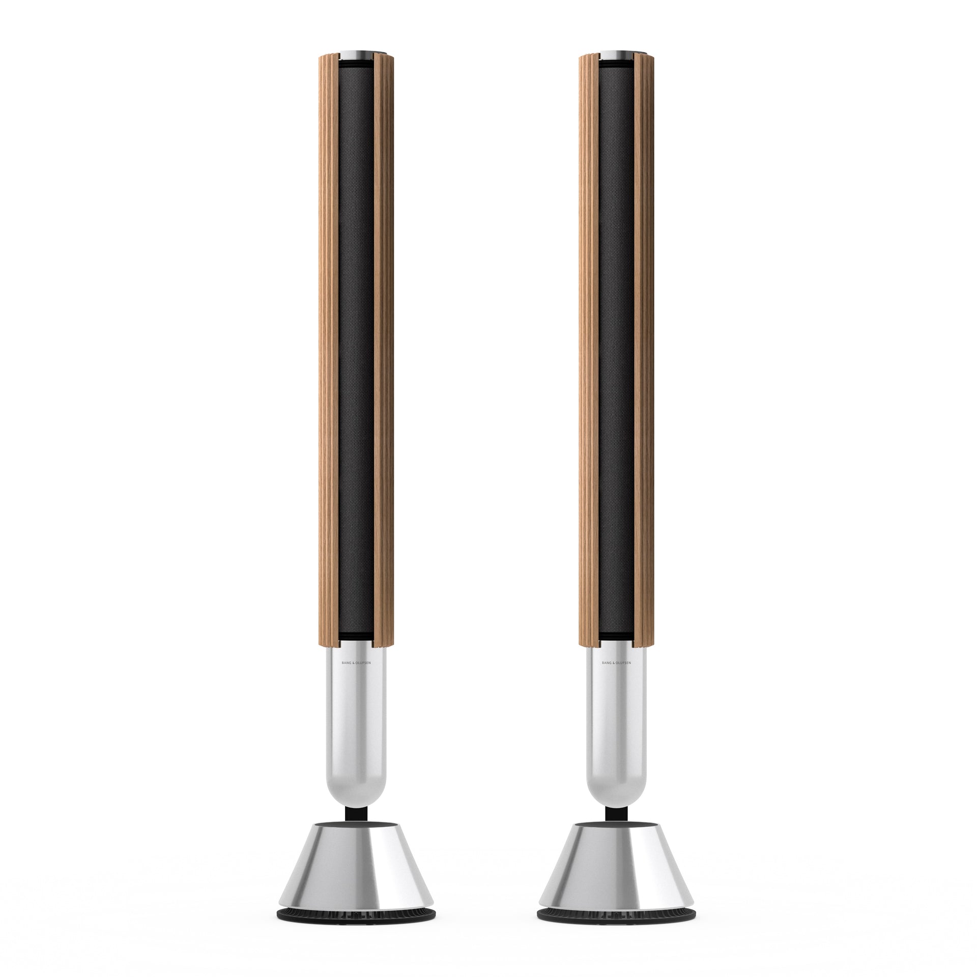 Pair of Bang & Olufsen Beolab 28 wireless speakers, light oak wood with black fabric grilles and silver bases.
