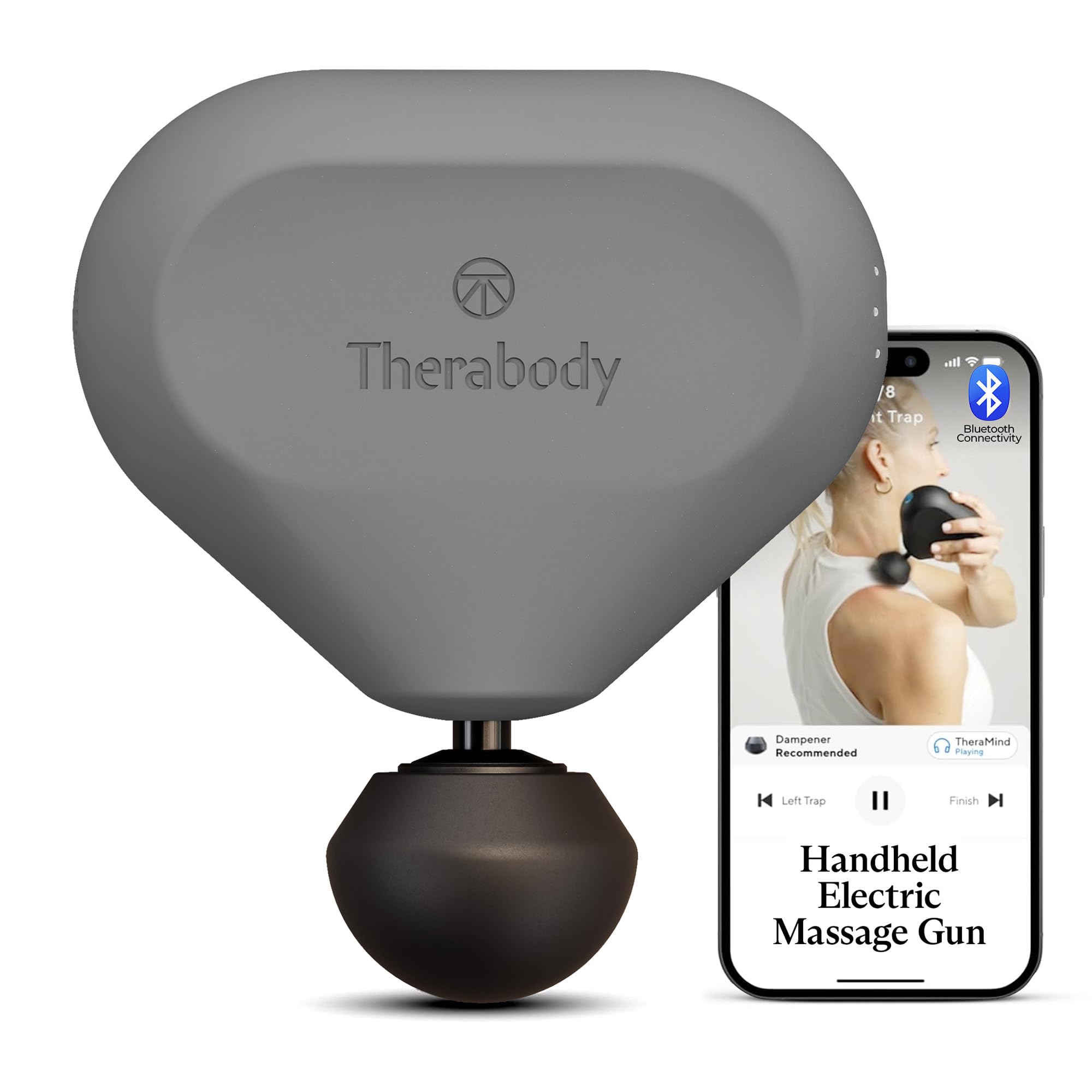 Grey Theragun Mini 2nd Gen handheld massage gun with black attachment, next to a smartphone showing the Therabody app.