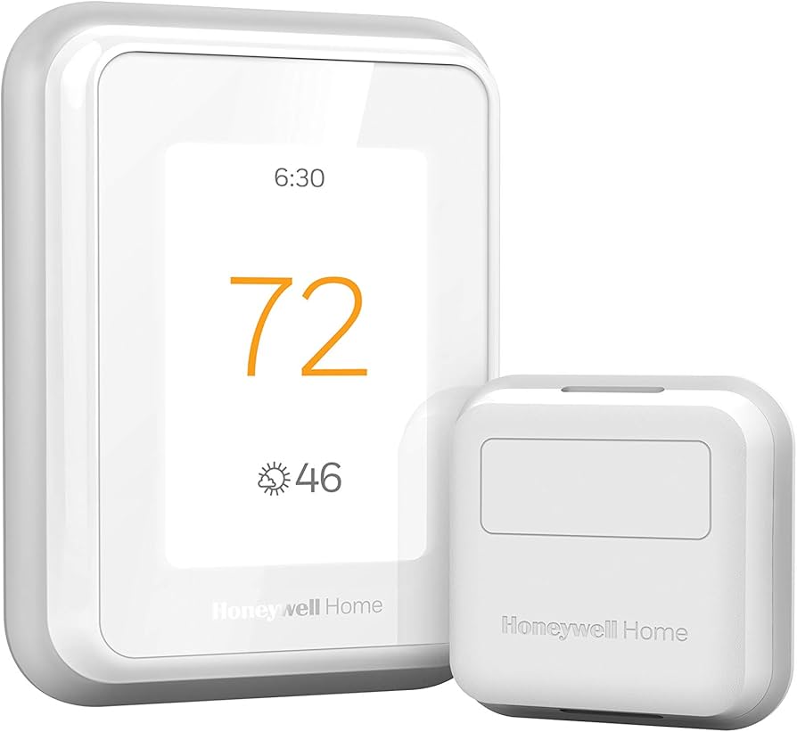 Honeywell Home T9 Smart Thermostat displaying 72 degrees and time 6:30, shown with its white smart room sensor.