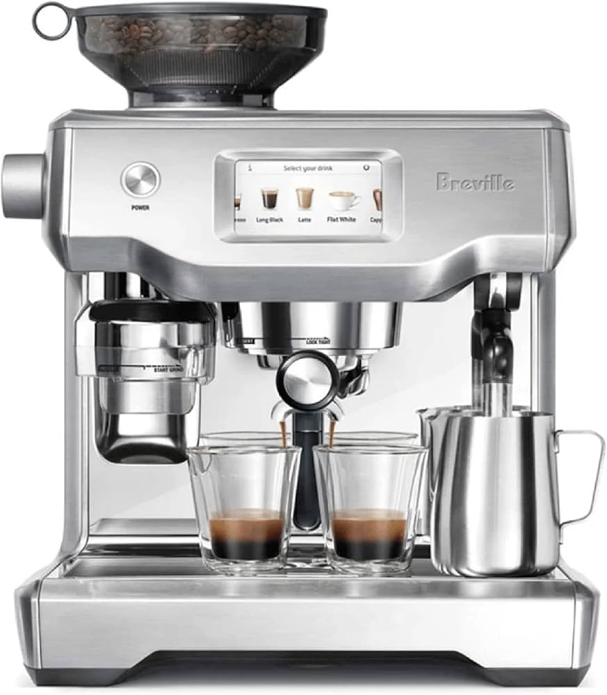 Silver Breville Oracle Touch automatic espresso machine brewing two shots, featuring an integrated grinder, touchscreen, and milk frother.